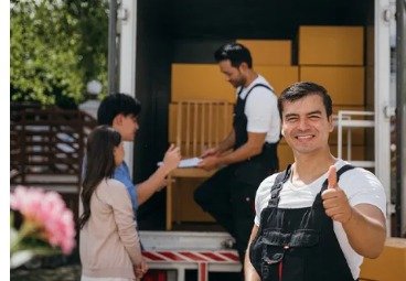 Movers unloading a truck